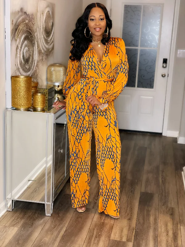 Feminine Dresses for Women in Bold Prints Orange You Cute Jumpsuit